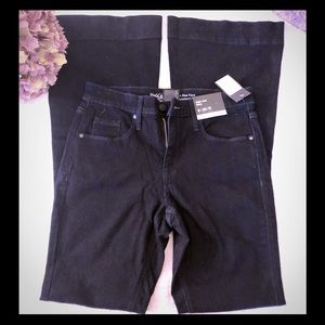 Dark high rise flare super stretch jeans.